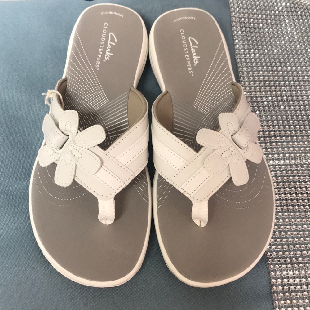 Clark’s white sandals